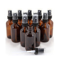 Hot sale empty 50ml amber refillable round glass spray bottle with mist fine sprayer